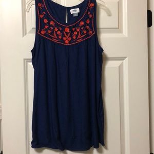 blue top with orange design